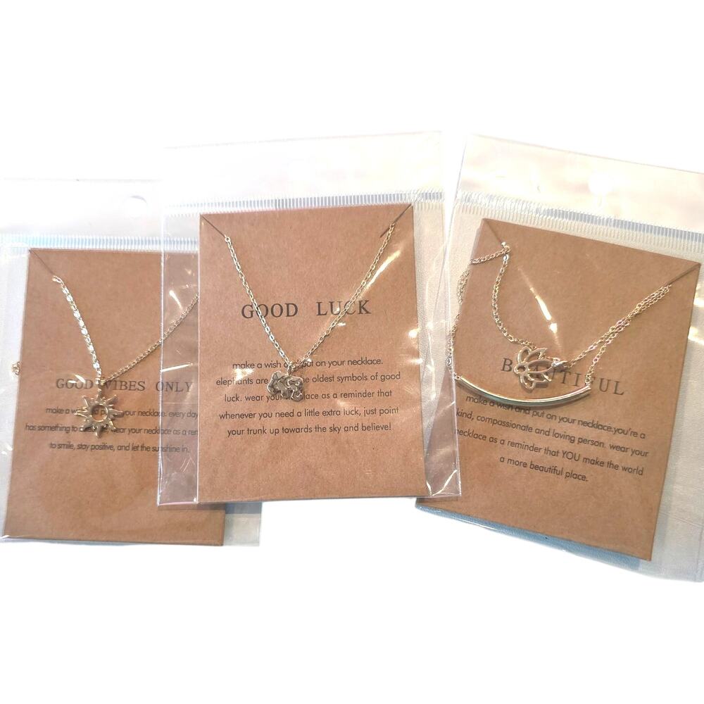 GOLD PLATED SET OF 3 NECKLACES SUNBURST, LOTUS, & ELEPHANT NEW PACKAGED